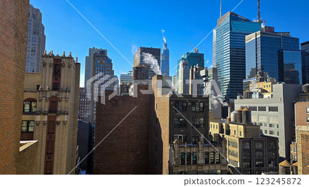 City skyline featuring modern and classic architecture, with prominent skyscrapers and urban buildings with colorful bright colors, capturing the essence of metropolitan life City skyline featuring modern and classic architecture, with prominent skyscrapers and urban buildings with colorful bright colors, capturing the essence of metropolitan life 123245872