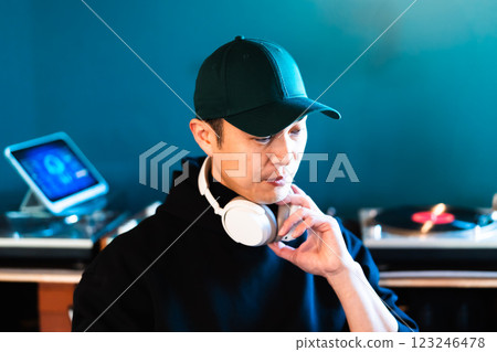 Middle-aged man enjoying the sound system 123246478