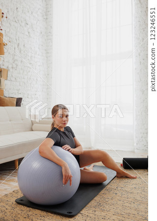 Slender girl in sportswear doing physical exercises. healthy lifestyle. Slender girl in sportswear doing physical exercises. healthy lifestyle. 123246551