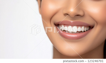 Radiant smile showcasing perfectly aligned teeth and healthy gums, enhancing facial beauty. Natural and beautiful smile of a happy woman. Radiant smile showcasing perfectly aligned teeth and healthy gums, enhancing facial beauty. Natural and beautiful smile of a happy woman. 123246701