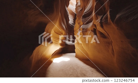 Striking canyon walls with textured sandstone formations and sunlight highlighting the shadows. A geological wonder created by time and erosion. Striking canyon walls with textured sandstone formations and sunlight highlighting the shadows. A geological wonder created by time and erosion. 123246754