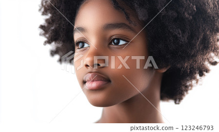 Portrait of a young girl with dark skin and curly hair, looking off to the side with a calm and gentle expression. She is on a white background. Portrait of a young girl with dark skin and curly hair, looking off to the side with a calm and gentle expression. She is on a white background. 123246793