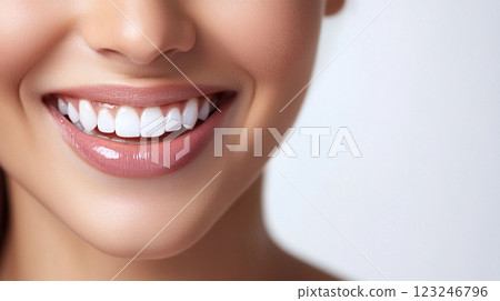 Radiant smile showcasing bright, healthy teeth. Gums appear healthy. Lips are coated in glossy, light pink lipstick. Clean and polished look. Radiant smile showcasing bright, healthy teeth. Gums appear healthy. Lips are coated in glossy, light pink lipstick. Clean and polished look. 123246796