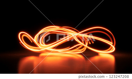 Abstract glowing light trails on a dark background create a dynamic and captivating visual effect with warm, inviting colors. 123247208