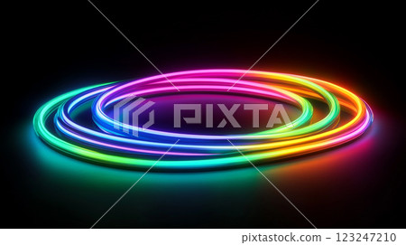 Vibrant light rings swirl in a mesmerizing dance of neon hues, creating a captivating visual spectacle against a dark backdrop. 123247210