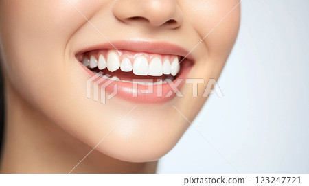 Radiant smile showcasing flawless white teeth. Close-up of a smiling woman reveals perfect teeth. The image highlights dental health and beauty. Radiant smile showcasing flawless white teeth. Close-up of a smiling woman reveals perfect teeth. The image highlights dental health and beauty. 123247721