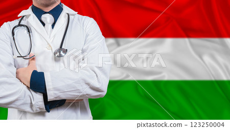 Male Doctor With Stethoscope On Hungary Flag. Doctor Holding Stethoscope On Hungary Flag Male Doctor With Stethoscope On Hungary Flag. Doctor Holding Stethoscope On Hungary Flag 123250004