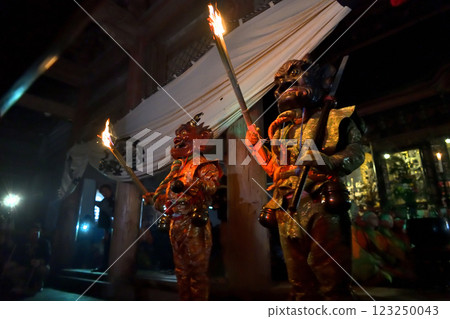 Masuiyama Zuigan Demon-Exorcism Ceremony: Red and blue demons dancing with torches in the dark Masuiyama Zuigan Demon-Exorcism Ceremony: Red and blue demons dancing with torches in the dark 123250043