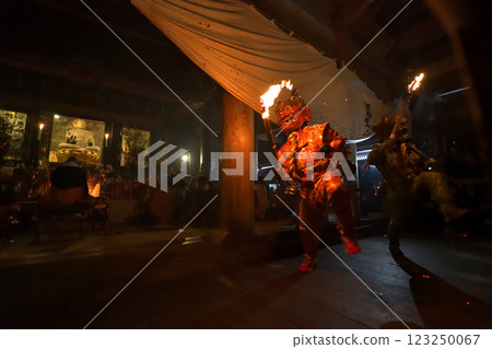 Demon-chasing ceremony at Masui-san Zuiganji Temple: Red and blue demons dancing with torches in the dark Demon-chasing ceremony at Masui-san Zuiganji Temple: Red and blue demons dancing with torches in the dark 123250067