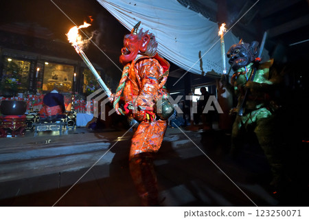 Demon-chasing ceremony at Masui-san Zuiganji Temple: Red and blue demons dancing with torches in the dark Demon-chasing ceremony at Masui-san Zuiganji Temple: Red and blue demons dancing with torches in the dark 123250071