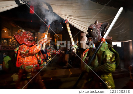 Demon-chasing ceremony at Zuiganji Temple: Red and blue demons slamming torches into the darkness Demon-chasing ceremony at Zuiganji Temple: Red and blue demons slamming torches into the darkness 123250228
