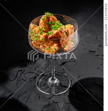 Delicious shrimp dish served in elegant glassware Delicious shrimp dish served in elegant glassware 123250810