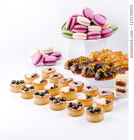 Delectable desserts displayed on a white background for treat lovers 123250855