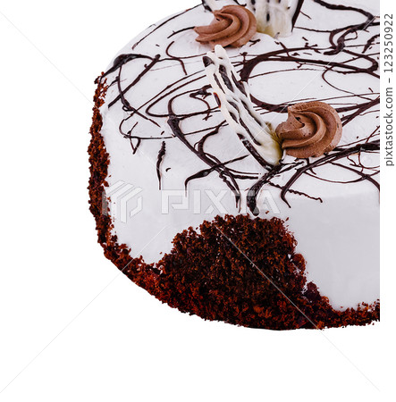 Delicious round chocolate cake with white icing and chocolate decorations isolated on white background Delicious round chocolate cake with white icing and chocolate decorations isolated on white background 123250922