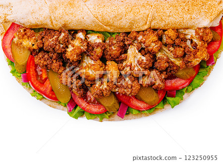Delicious roasted cauliflower loaded sandwich with fresh vegetables 123250955