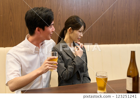 A drunk man drinking heavily 123251241