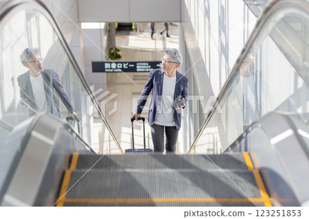 Middle-aged man, airport, travel (property release obtained & facility inspection passed material) 123251853