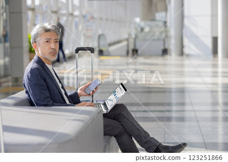 Middle-aged man, airport, travel (property release obtained & facility inspection passed material) 123251866