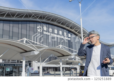 Middle-aged man, airport, business trip (property release obtained & facility inspection passed material) 123251889