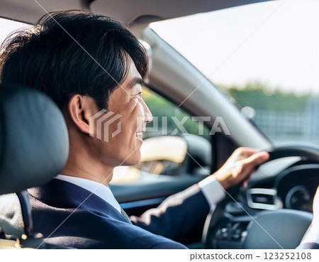 Company employee driving a business car 123252108