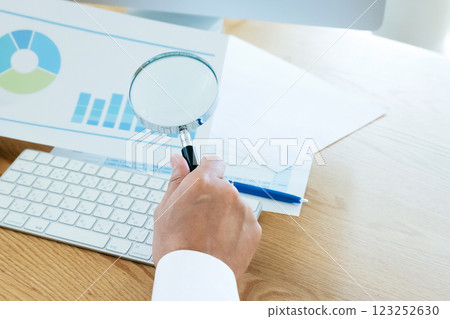 Men's hand looking at materials 123252630