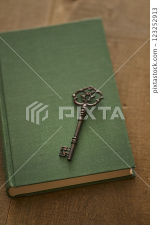 Image of antique book and key Image of antique book and key 123252913