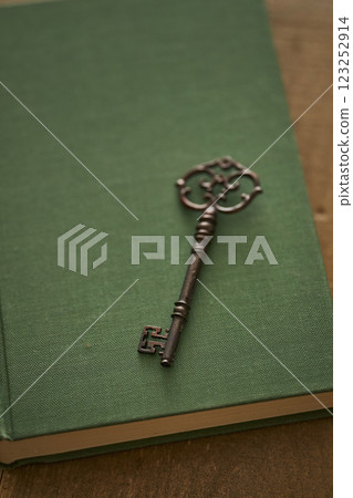 Image of antique book and key Image of antique book and key 123252914