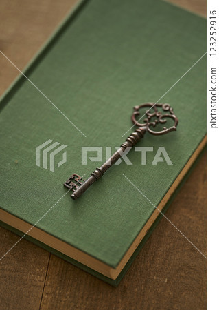 Image of antique book and key Image of antique book and key 123252916