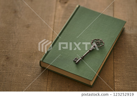 Image of antique book and key Image of antique book and key 123252919
