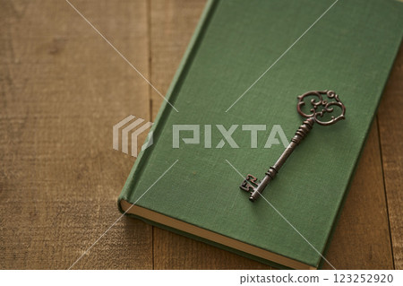 Image of antique book and key Image of antique book and key 123252920