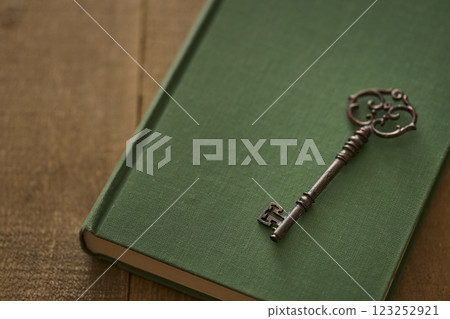 Image of antique book and key Image of antique book and key 123252921