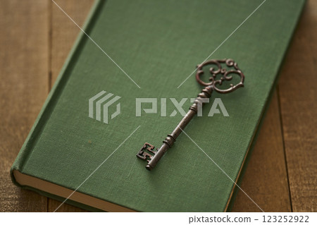 Image of antique book and key Image of antique book and key 123252922