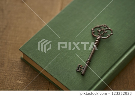 Image of antique book and key Image of antique book and key 123252923