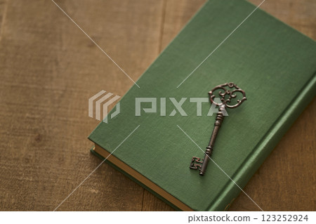 Image of antique book and key Image of antique book and key 123252924