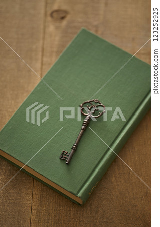 Image of antique book and key Image of antique book and key 123252925