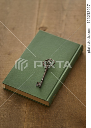 Image of antique book and key Image of antique book and key 123252927
