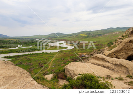 View on the Kura river and Caucasus mountains from Ancient cave city Uplistsikhe, Georgia 123253042