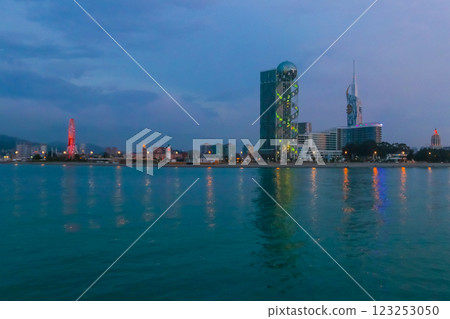 Batumi, Adjara, Georgia. View from the sea on illuminated resort town at evening Batumi, Adjara, Georgia. View from the sea on illuminated resort town at evening 123253050