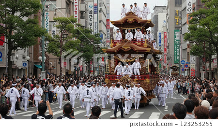 A traditional and passionate Japanese festival, with gorgeous floats and festival participants A traditional and passionate Japanese festival, with gorgeous floats and festival participants 123253255