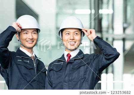 Workers working in an office building. Filming cooperation: SKY Perfect Tokyo Media Center Workers working in an office building. Filming cooperation: SKY Perfect Tokyo Media Center 123253682