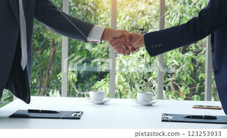 Businessman handshake manager recruitment team business. Partners shaking hands together greeting mergers and acquisitions. Shakehand Teamwork Partnership in office meeting room. Business concept 123253933
