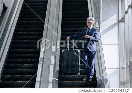 Middle-aged man, airport, business trip (property release obtained & facility inspection passed material) 123254337