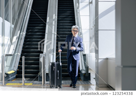 Middle-aged man, airport, business trip (property release obtained & facility inspection passed material) 123254338