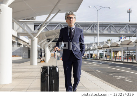 Middle-aged man, airport, business trip (property release obtained & facility inspection passed material) 123254339