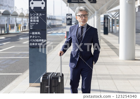 Middle-aged man, airport, business trip (property release obtained & facility inspection passed material) 123254340