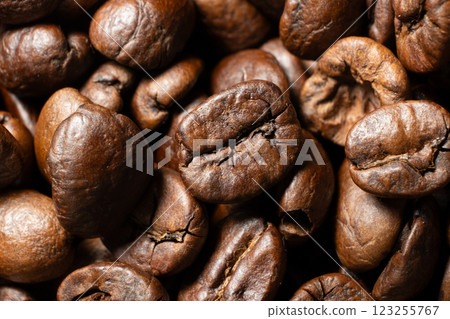 Decaffeinated coffee beans roasted close up Decaffeinated coffee beans roasted close up 123255767