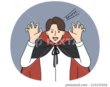 Man in dracula costume for halloween shows nails and fangs, inviting to visit store of scary outfits Man in dracula costume for halloween shows nails and fangs, inviting to visit store of scary outfits 123255856