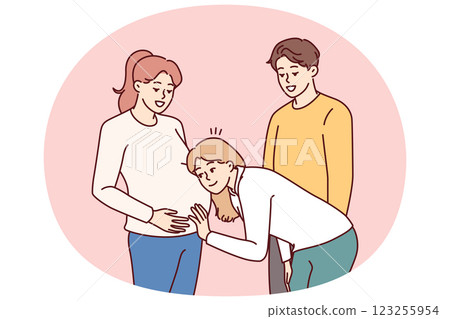 Pregnant woman stands with friends and allows to put ear to stomach to hear movements of baby Pregnant woman stands with friends and allows to put ear to stomach to hear movements of baby 123255954