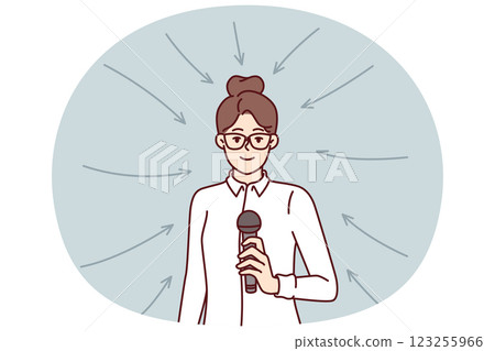 Business woman with microphone stands among arrows for concept participation in professional seminar 123255966