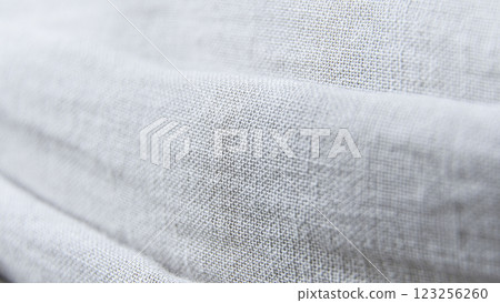 Linen fabric texture background. Soft light textile fabric Linen fabric texture background. Soft light textile fabric 123256260
